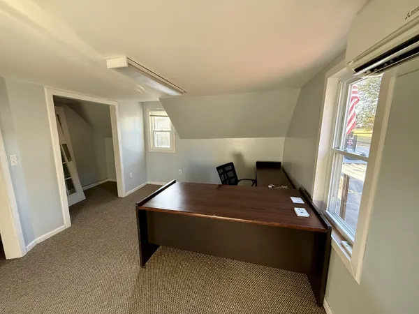 an empty room with windows