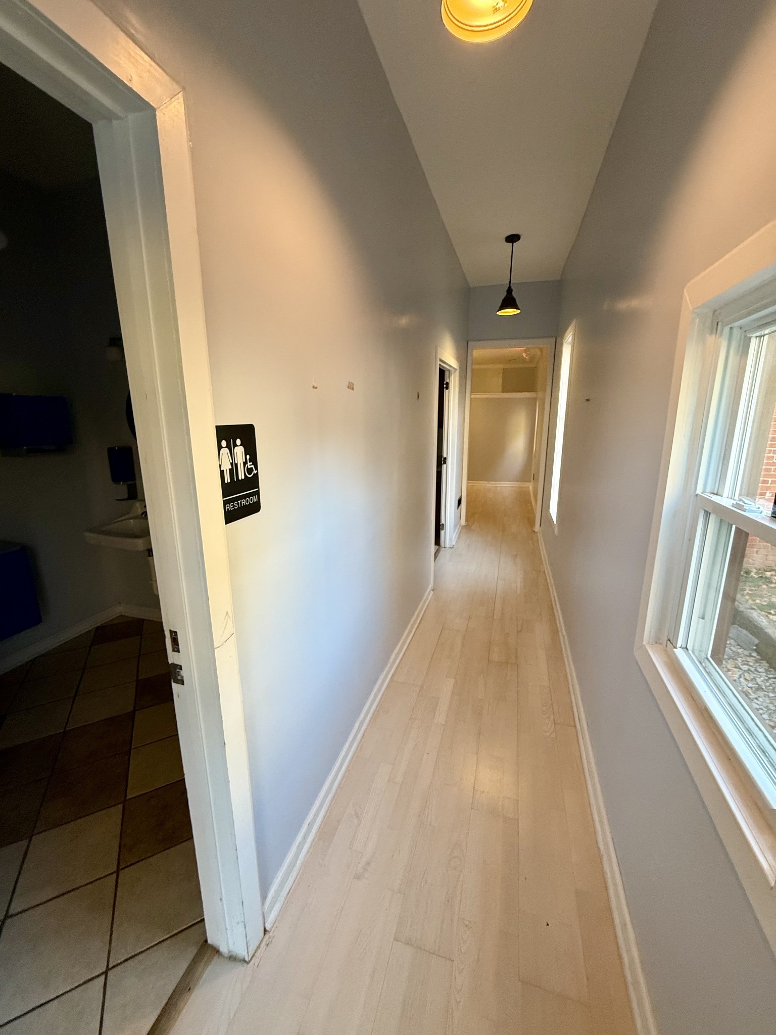 1116 Main Street Pleasant View, TN 37146 - Photo 6 of 29 a view of a hallway view with wooden floor and staircase