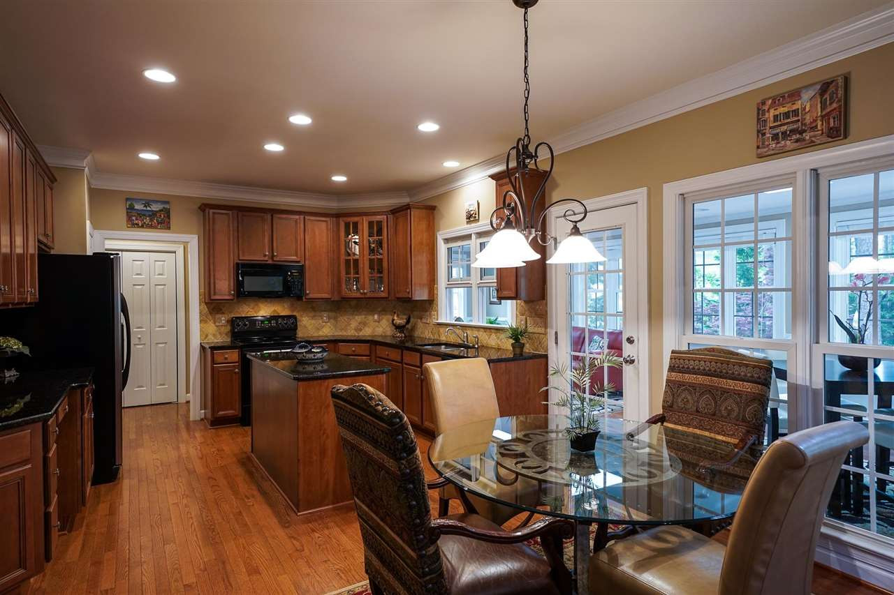 6000 Tiffield Way Wake Forest, NC 27587 - Photo 9 of 30 Large kitchen with granite, plenty of cabinets, counterspace, desk and two pantries! Kitchen