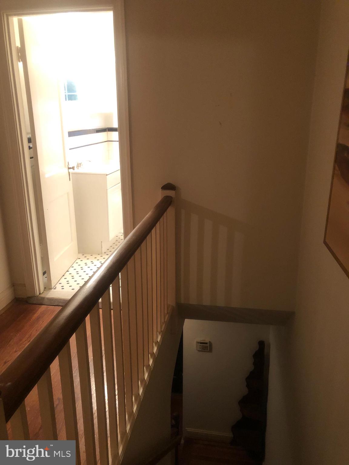 3909 Rexmere Road Baltimore, MD 21218 - Photo 12 of 42 Stairwell Leading to Upper Level