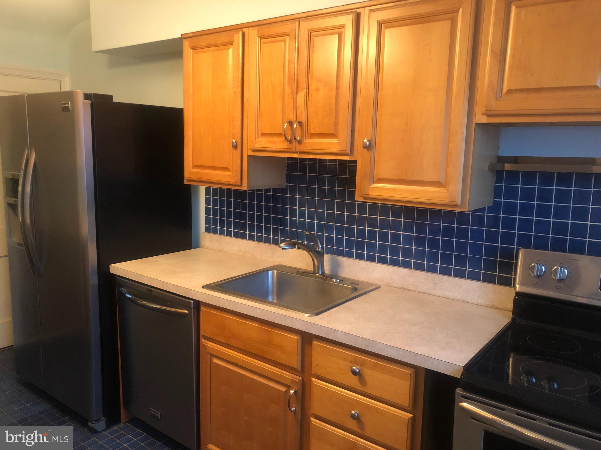 3909 Rexmere Road Baltimore, MD 21218 - Photo 3 of 42 Oak Cabinets