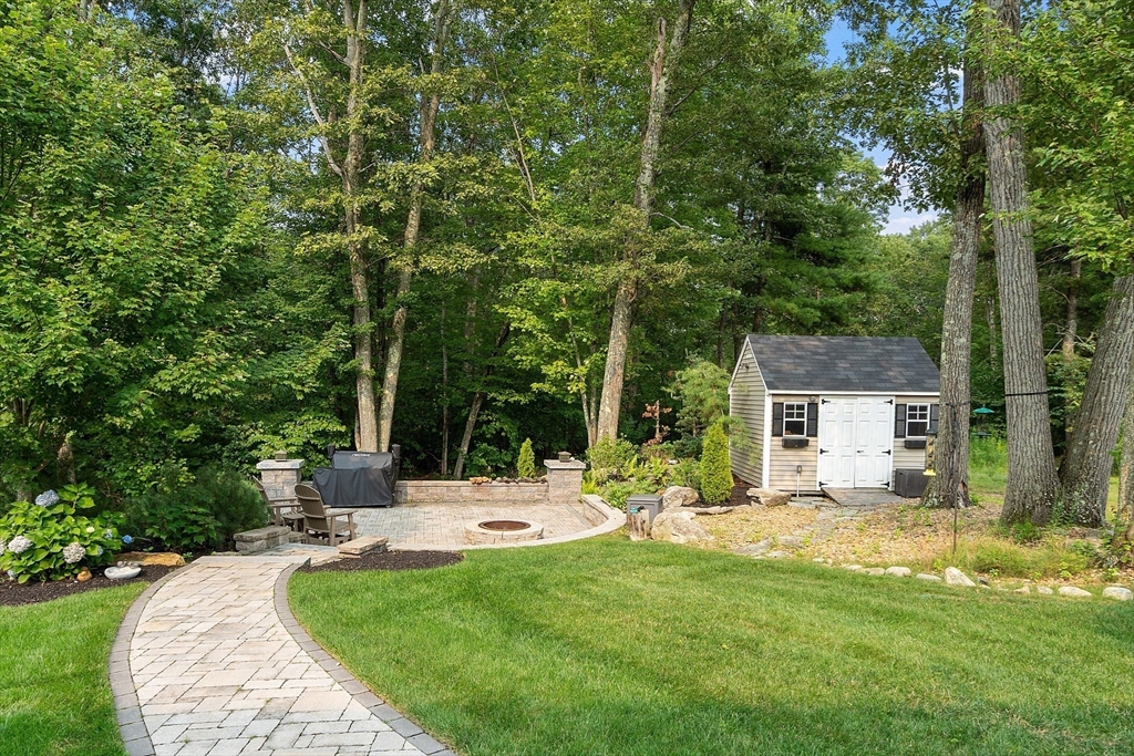 46 Jordan Road Holden, MA 01520 - Photo 37 of 42 a view of a house with backyard and sitting area