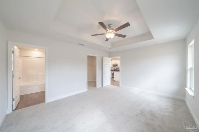 a view of empty room with closet