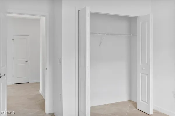 a bathroom with a granite countertop sink and vanity