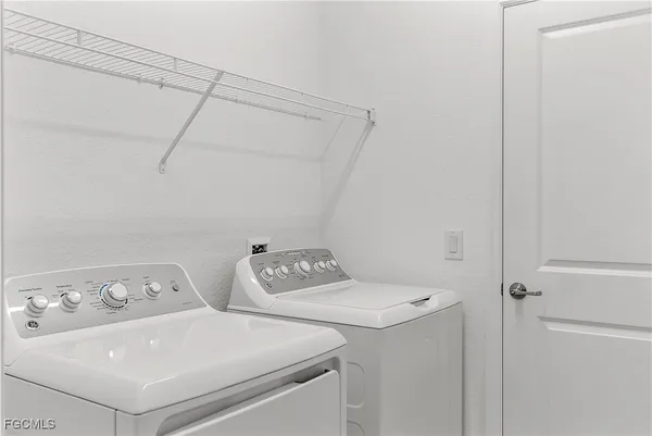 a kitchen with a stove and cabinets