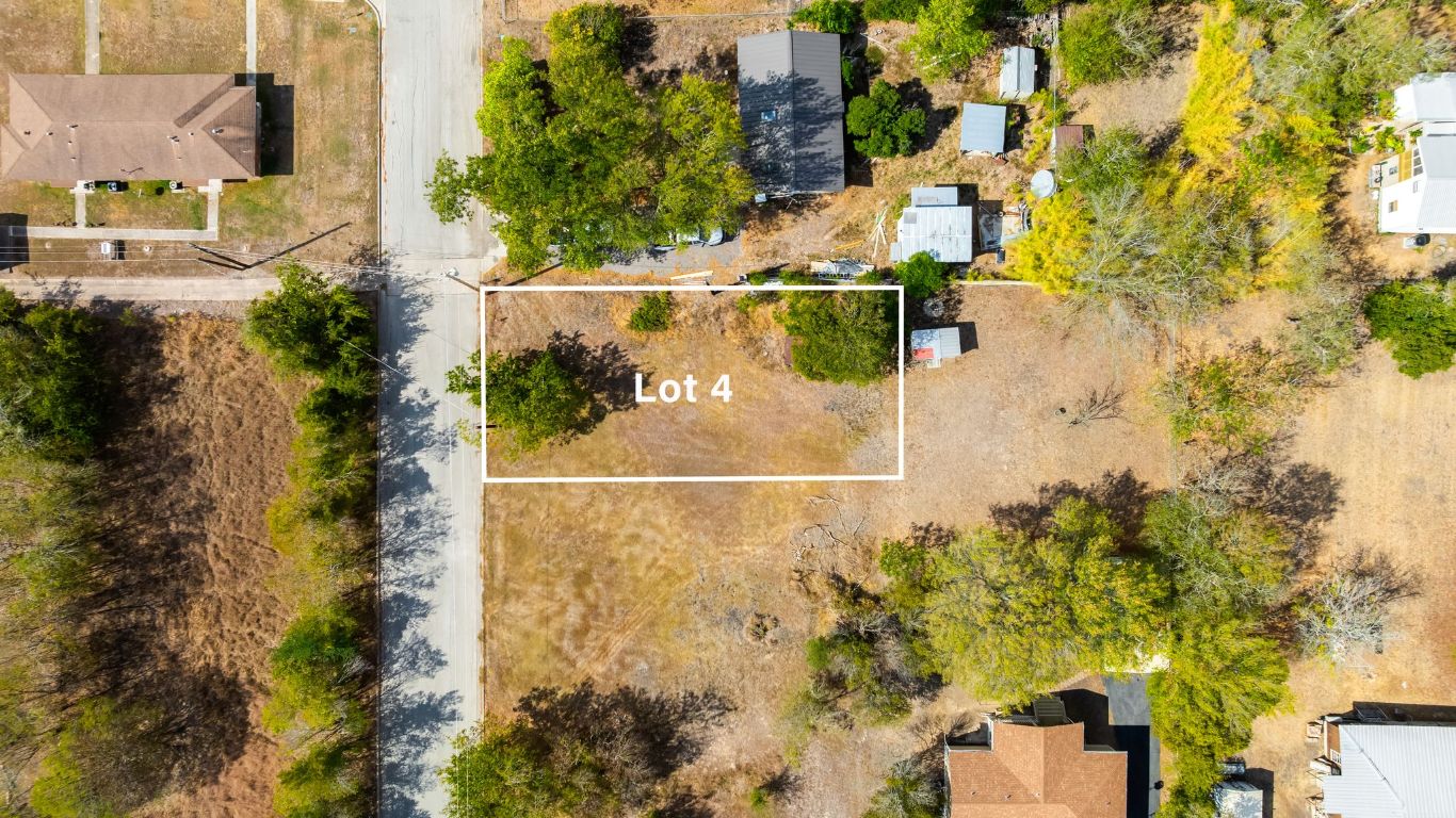 321 West Olive Street Lockhart, TX 78644 - Photo 2 of 6 an aerial view of residential houses with outdoor space