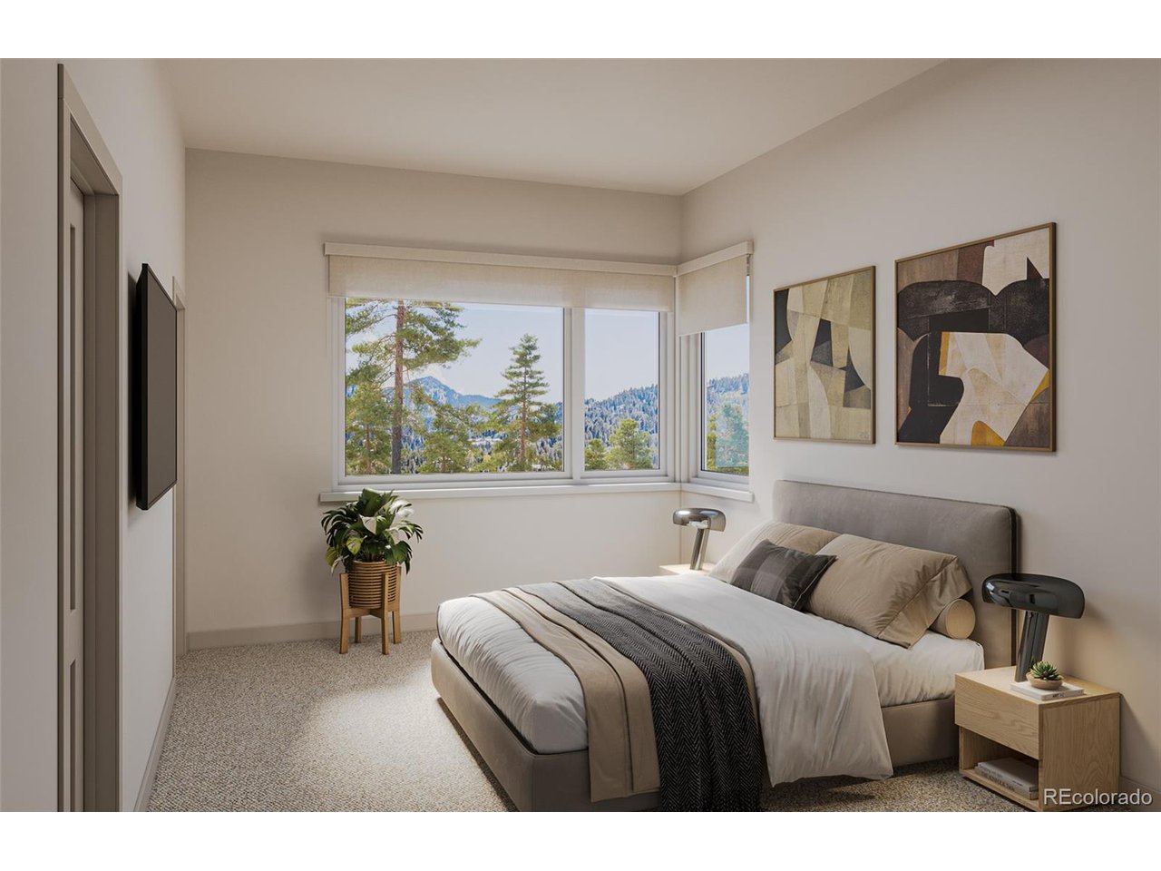 624 Montezuma Road, Unit 3 Keystone, CO 80435 - Photo 21 of 36 a bedroom with a bed and a painting on the wall