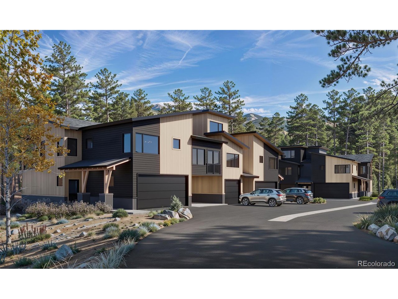 624 Montezuma Road, Unit 3 Keystone, CO 80435 - Photo 23 of 36 a front view of a house with a yard