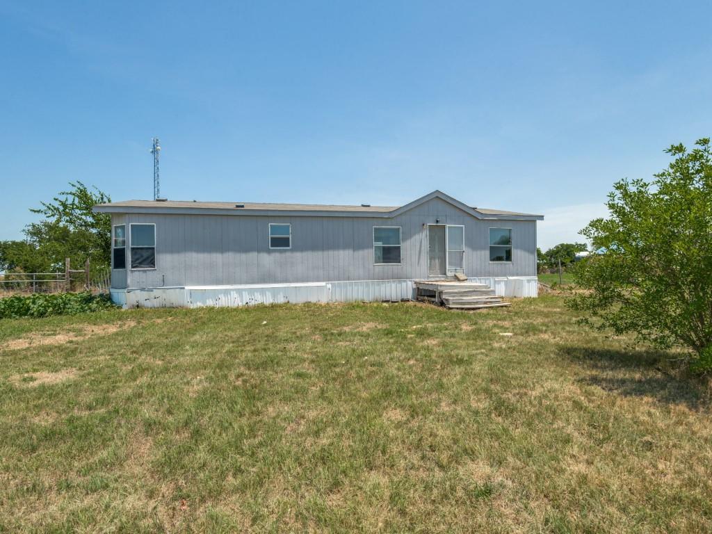 4001 Meadow Vista Circle Celina, TX 75009 - Photo 1 of 1 View of front of home with a front lawn and fence