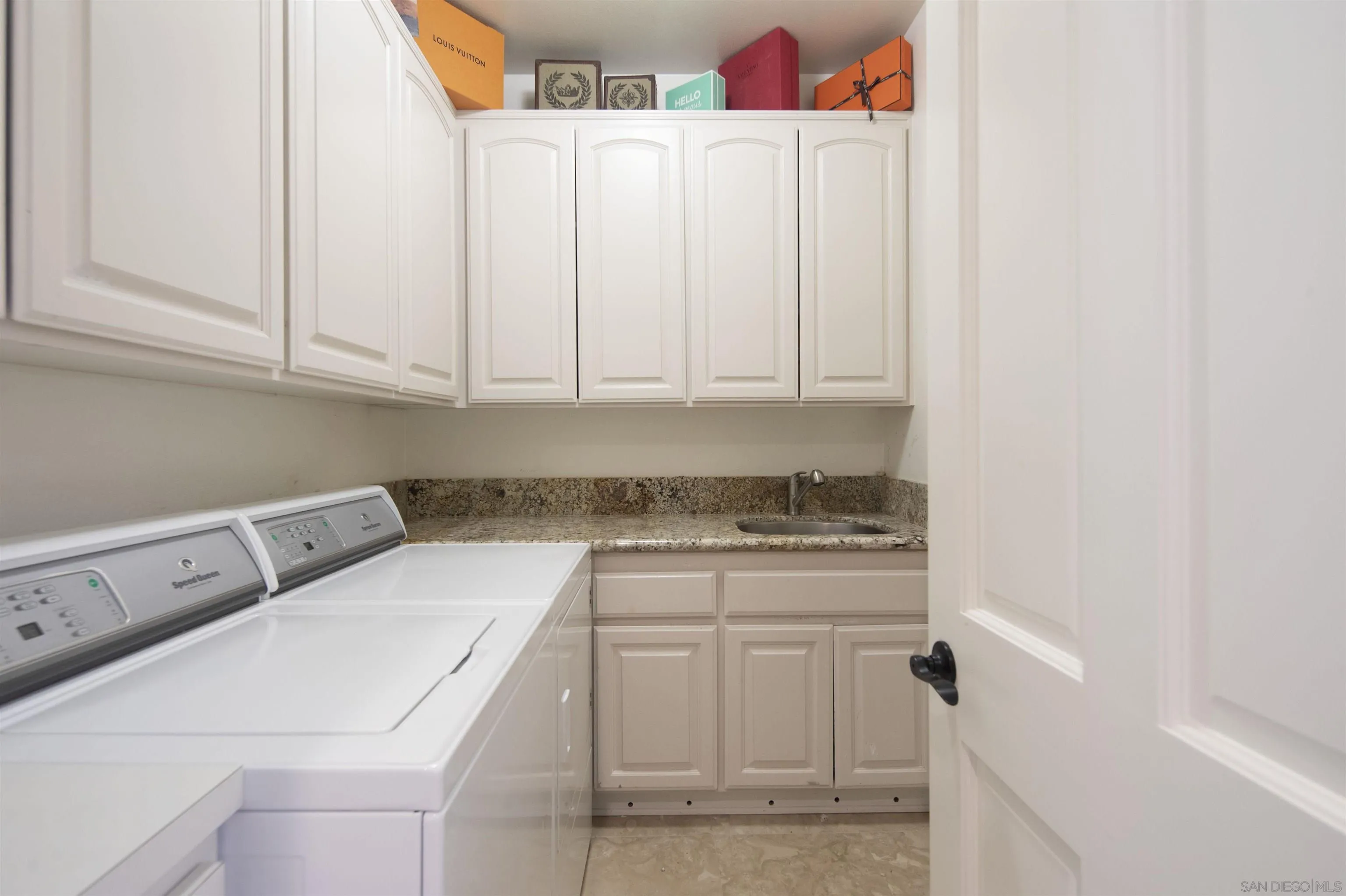 15448 Pimlico Corte Rancho Santa Fe, CA 92067 - Photo 31 of 31 a utility room with dryer and washer