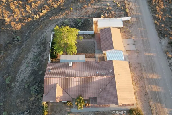 aerial view of a house with a garden