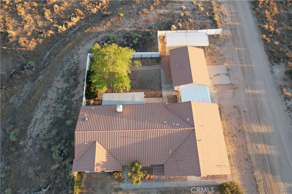 7653 Phelan Road Phelan, CA 92371 - Photo 2 of 10 aerial view of a house with a garden