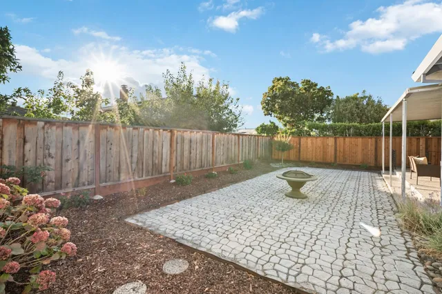 a backyard of a house with lots of green space
