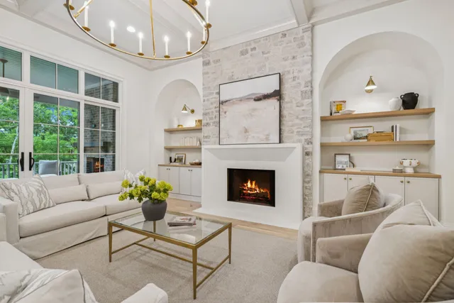 a kitchen with kitchen island granite countertop a sink a center island and cabinets