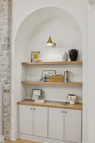 a kitchen that has a sink and a stove