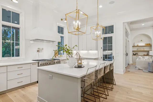 a large building with a big yard and large trees