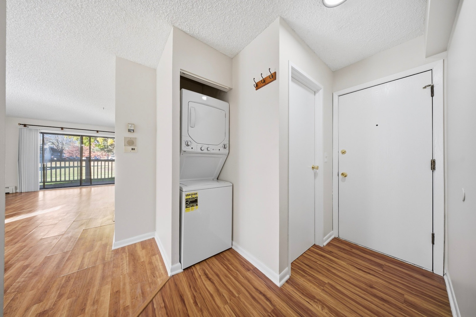 291 North Gregory Street, Unit 6 Aurora, IL 60504 - Photo 8 of 27 a view of hallway with wooden floor