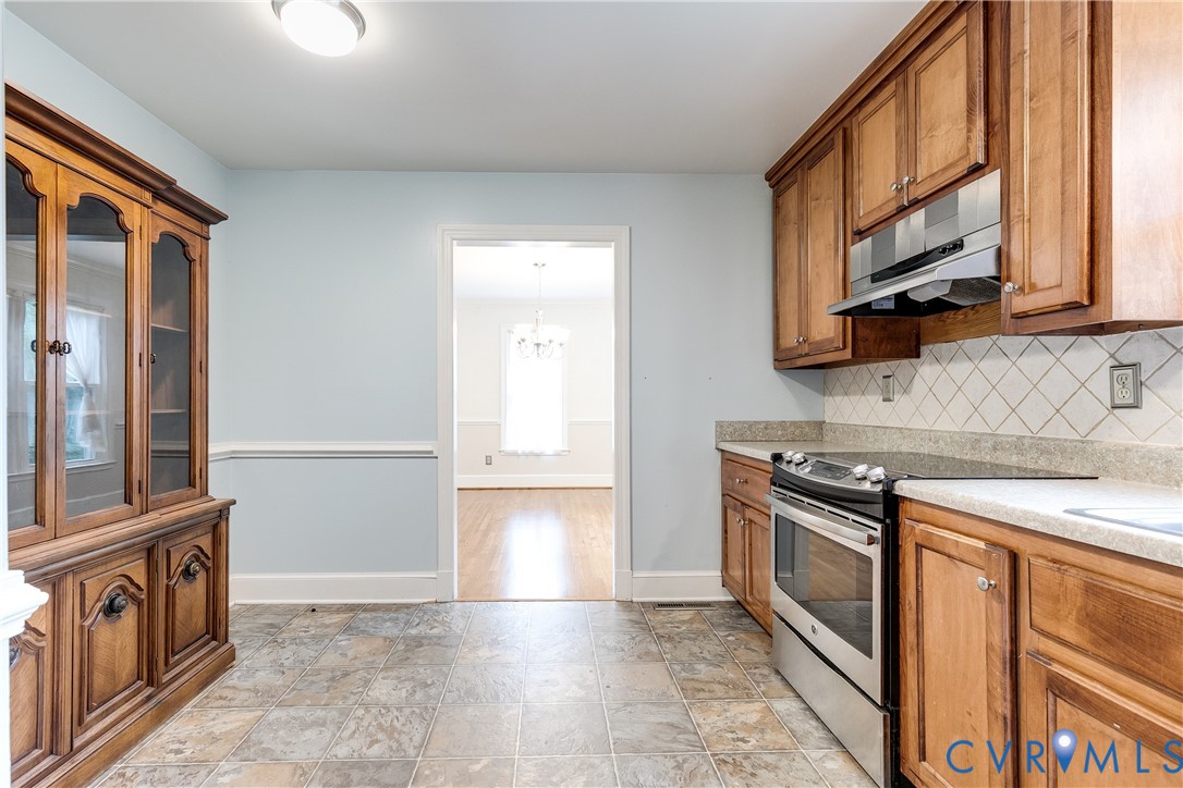 3924 Belspring Road Chester, VA 23831 - Photo 15 of 36 Kitchen featuring wood cabinetry, stainless steel