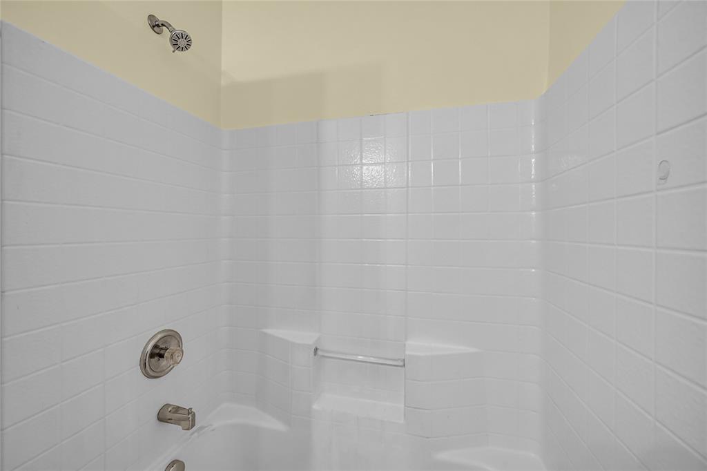 705 Loftin Street Crowley, TX 76036 - Photo 25 of 31 Bathroom view of tub / shower combination