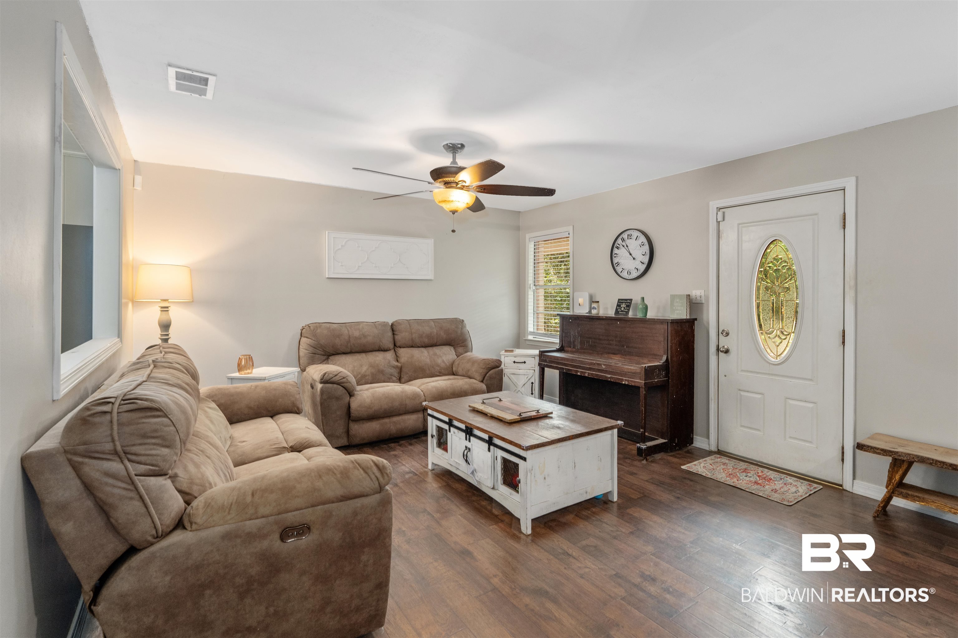 922 Dauphine Circle Daphne, AL 36526 - Photo 6 of 29 Living room featuring a ceiling fan and dark wood finished floors