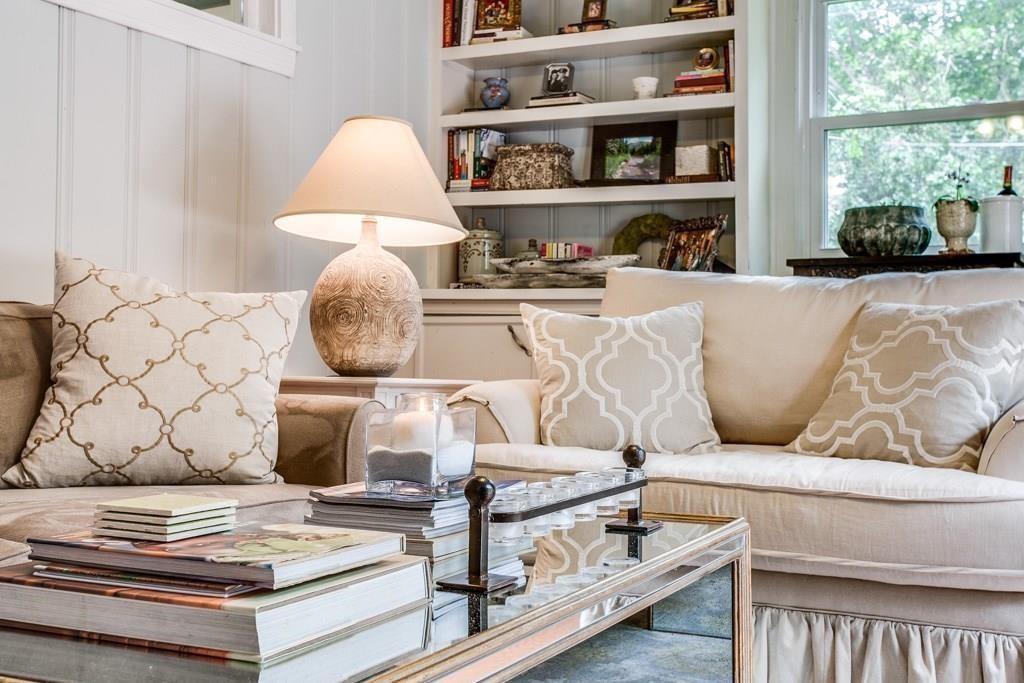 6043 Llano Avenue Dallas, TX 75206 - Photo 16 of 40 a living room with furniture and a lamp