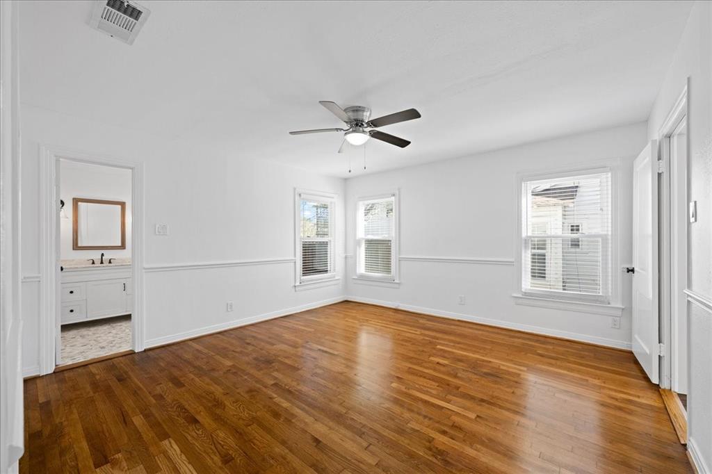 6043 Llano Avenue Dallas, TX 75206 - Photo 27 of 40 wooden floor in an empty room with a window