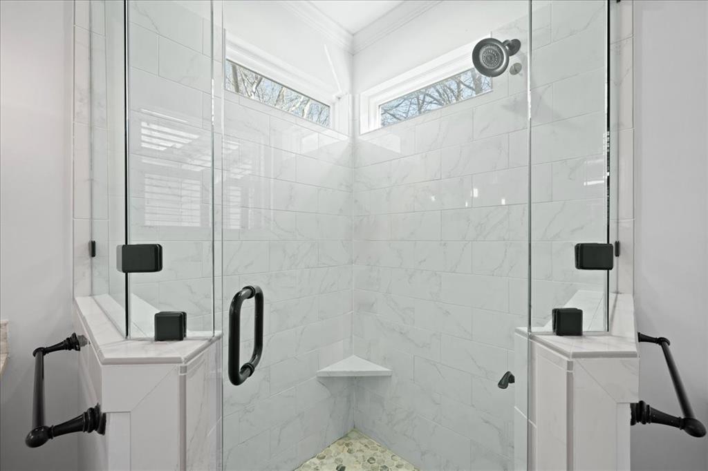 6043 Llano Avenue Dallas, TX 75206 - Photo 31 of 40 a bathroom with a shower