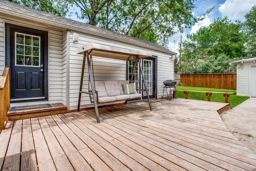 6043 Llano Avenue Dallas, TX 75206 - Photo 32 of 40 a backyard of a house with seating space