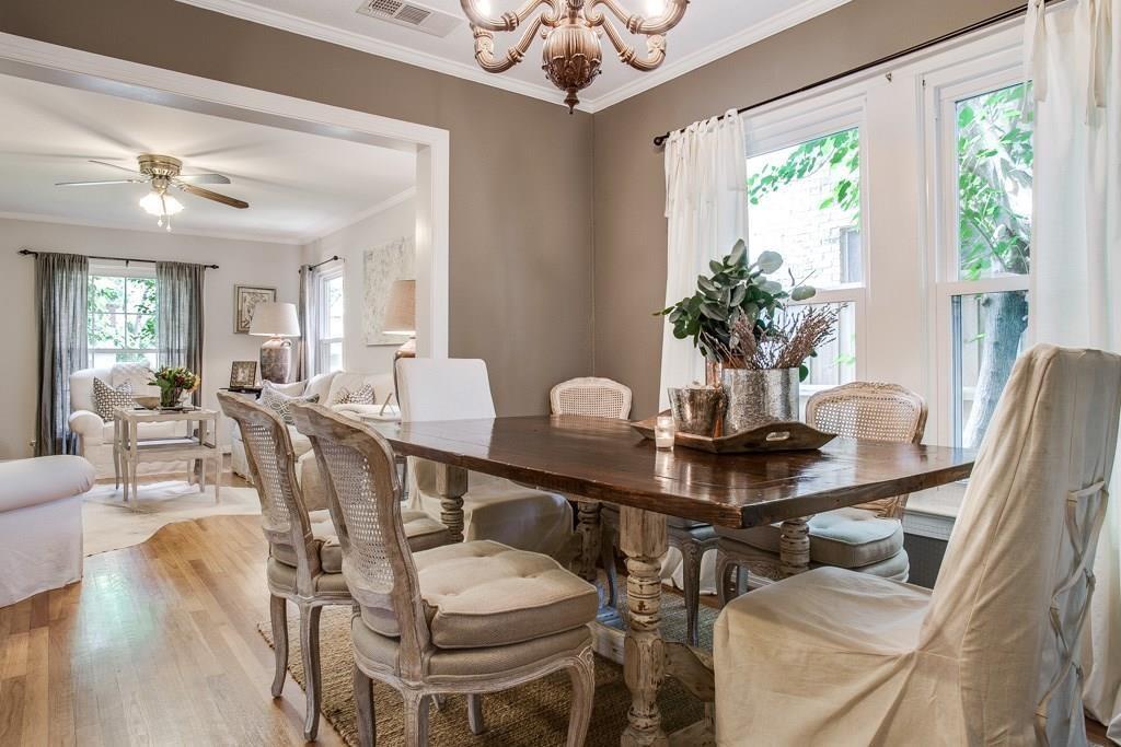 6043 Llano Avenue Dallas, TX 75206 - Photo 6 of 40 a view of a dining room with furniture window and wooden floor