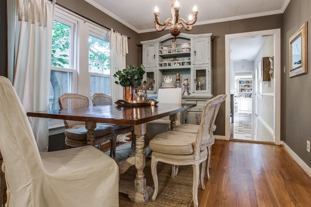 6043 Llano Avenue Dallas, TX 75206 - Photo 7 of 40 a view of a dining room with furniture window and wooden floor