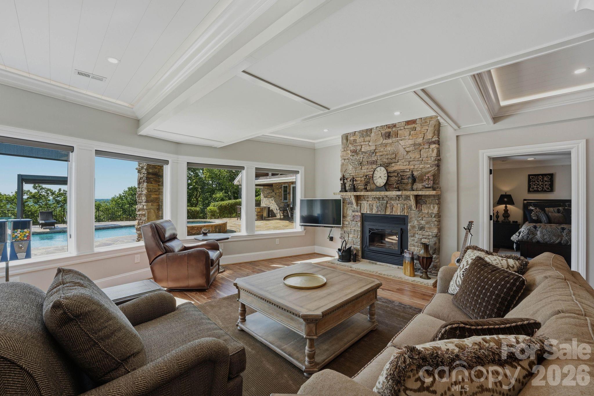 605 Recore Rdg Road Bessemer City, NC 28016 - Photo 23 of 47 a living room with furniture large window and a fireplace