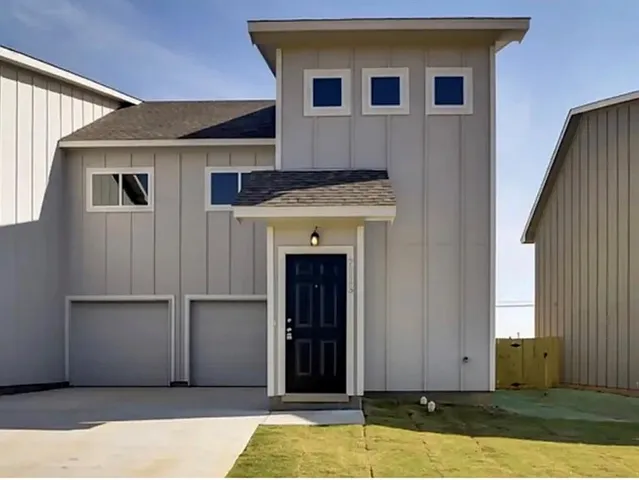 a view of a house with white door