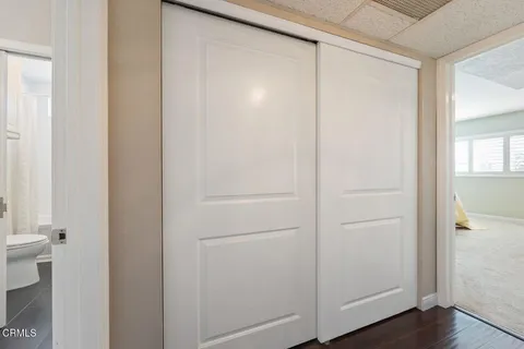 a view of a bathroom from a hallway