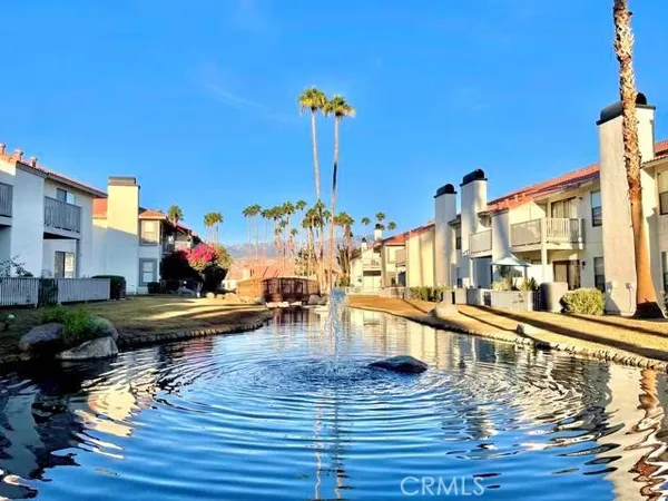 swimming pool view with a outdoor seating