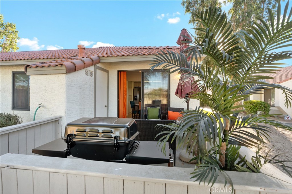 43376 Cook Street, Unit 125 Palm Desert, CA 92211 - Photo 33 of 45 a kitchen with a sink and a stove