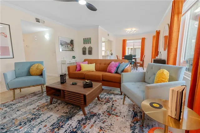 a view of a dining room with furniture and window