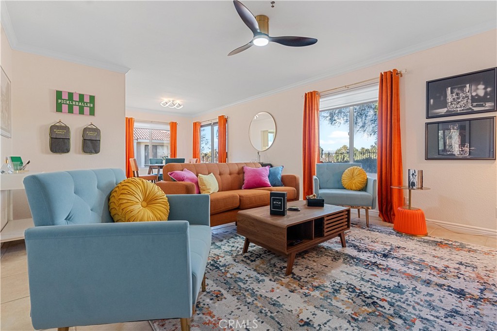 43376 Cook Street, Unit 125 Palm Desert, CA 92211 - Photo 40 of 45 a living room with fireplace furniture and a rug