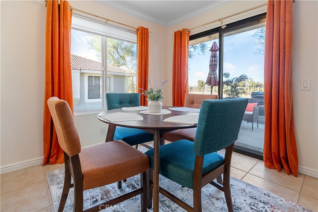 43376 Cook Street, Unit 125 Palm Desert, CA 92211 - Photo 41 of 45 a view of a dining room with furniture and window