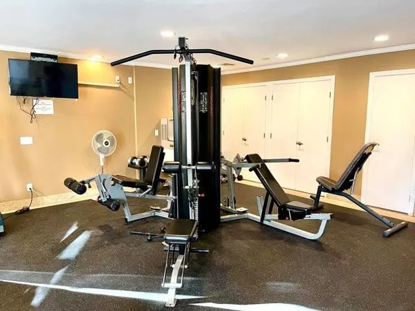 a view of a room with gym equipment