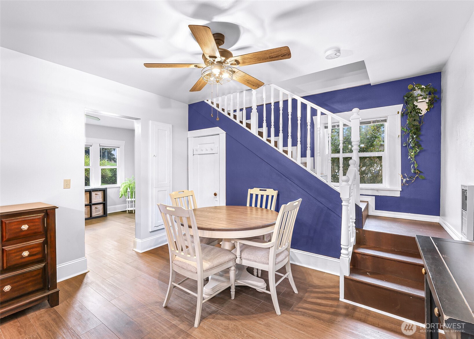 6981 Hannegan Road Lynden, WA 98264 - Photo 11 of 25 a view of a dining room with furniture and wooden floor