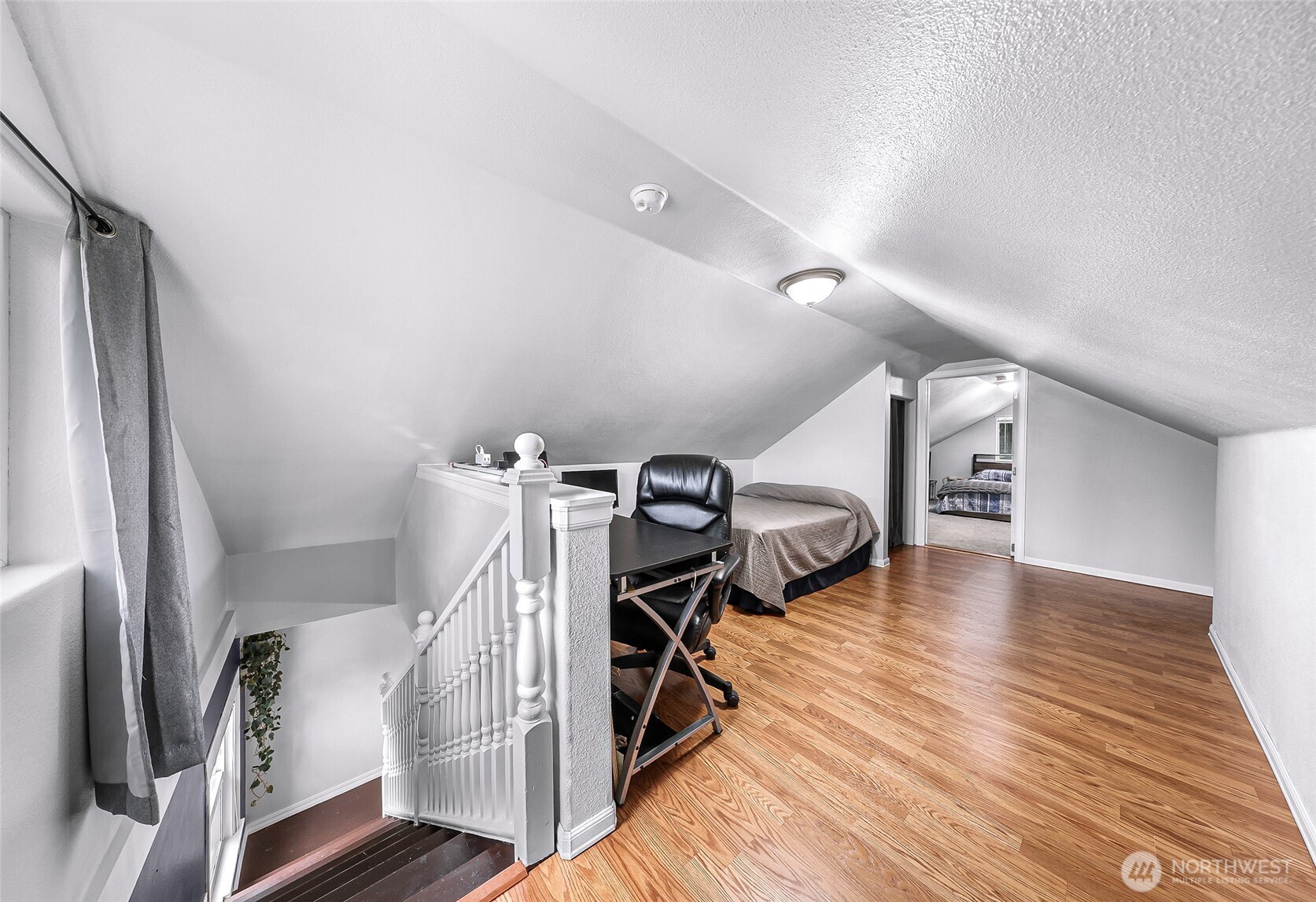 6981 Hannegan Road Lynden, WA 98264 - Photo 16 of 25 a view of a hallway with wooden floor