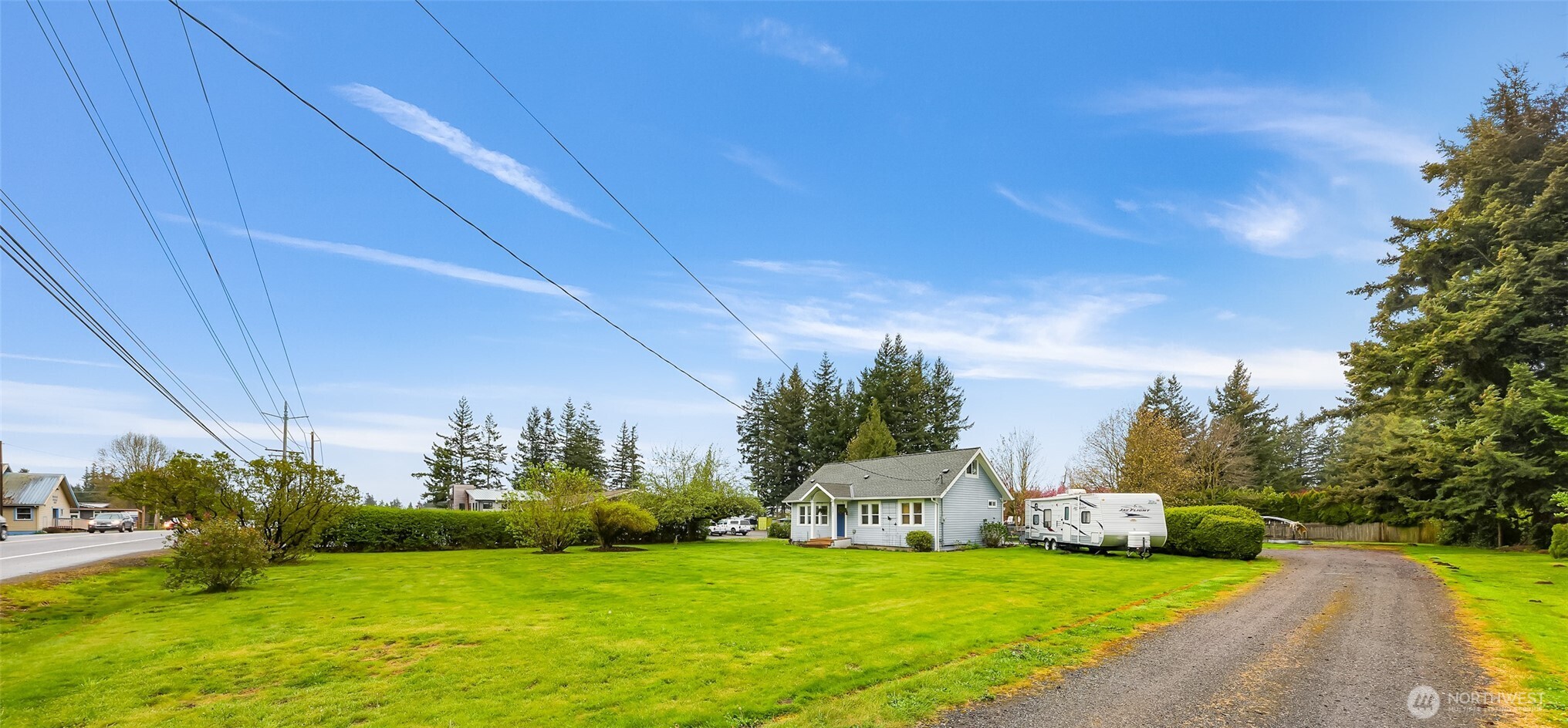 6981 Hannegan Road Lynden, WA 98264 - Photo 2 of 25 a view of a golf course with the garden