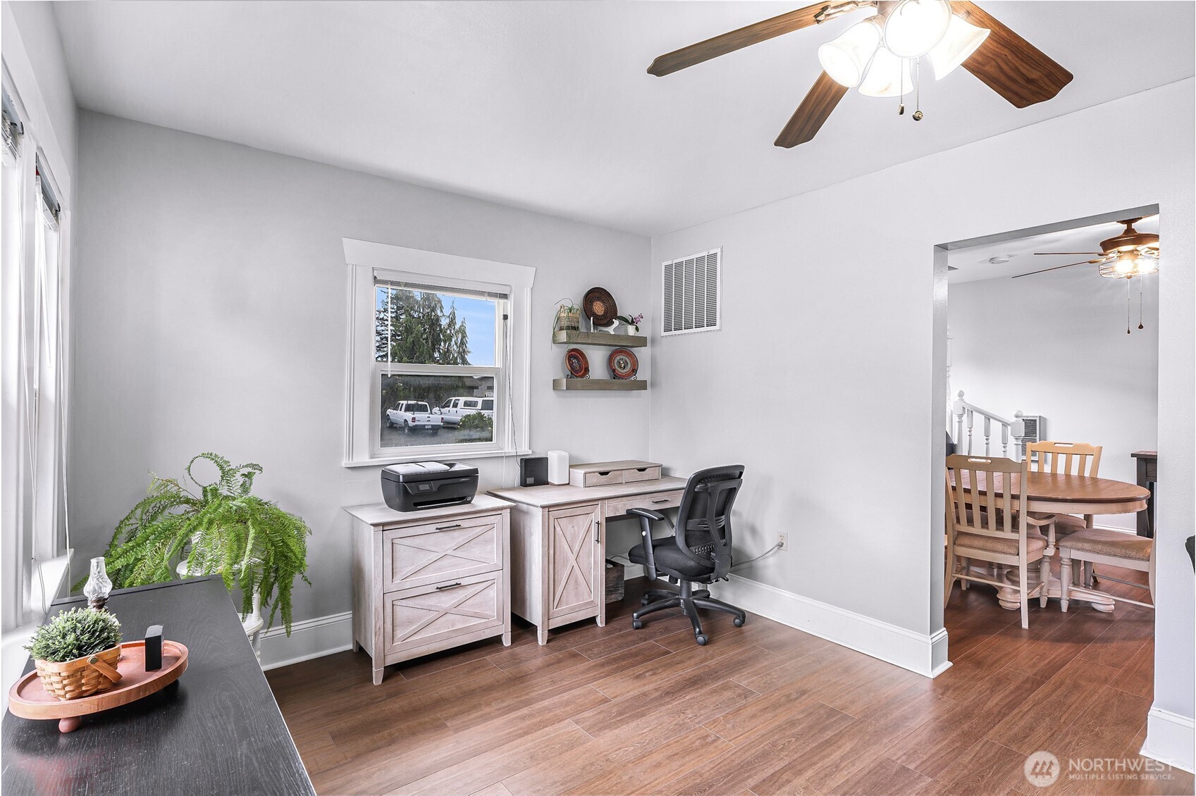6981 Hannegan Road Lynden, WA 98264 - Photo 7 of 25 a view of a workspace with furniture and a window