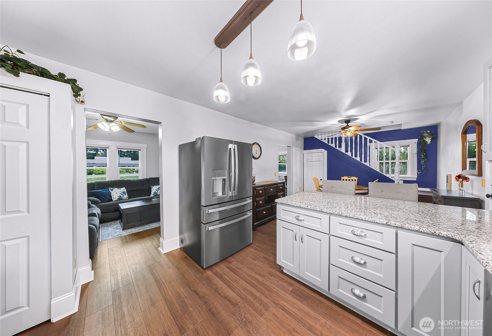 6981 Hannegan Road Lynden, WA 98264 - Photo 9 of 25 a kitchen with a refrigerator and a sink