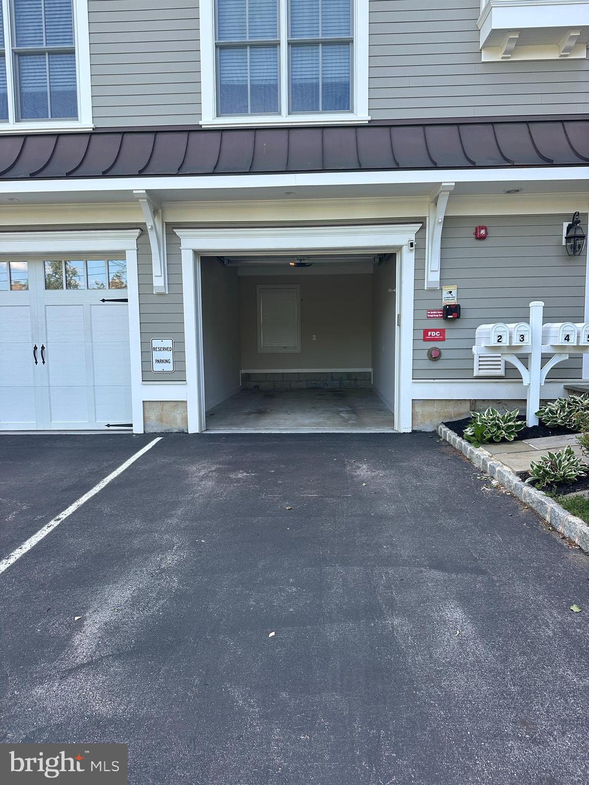 200 West Wayne Avenue, Unit 5 Wayne, PA 19087 - Photo 15 of 16 Private 1 car garage with spot in front