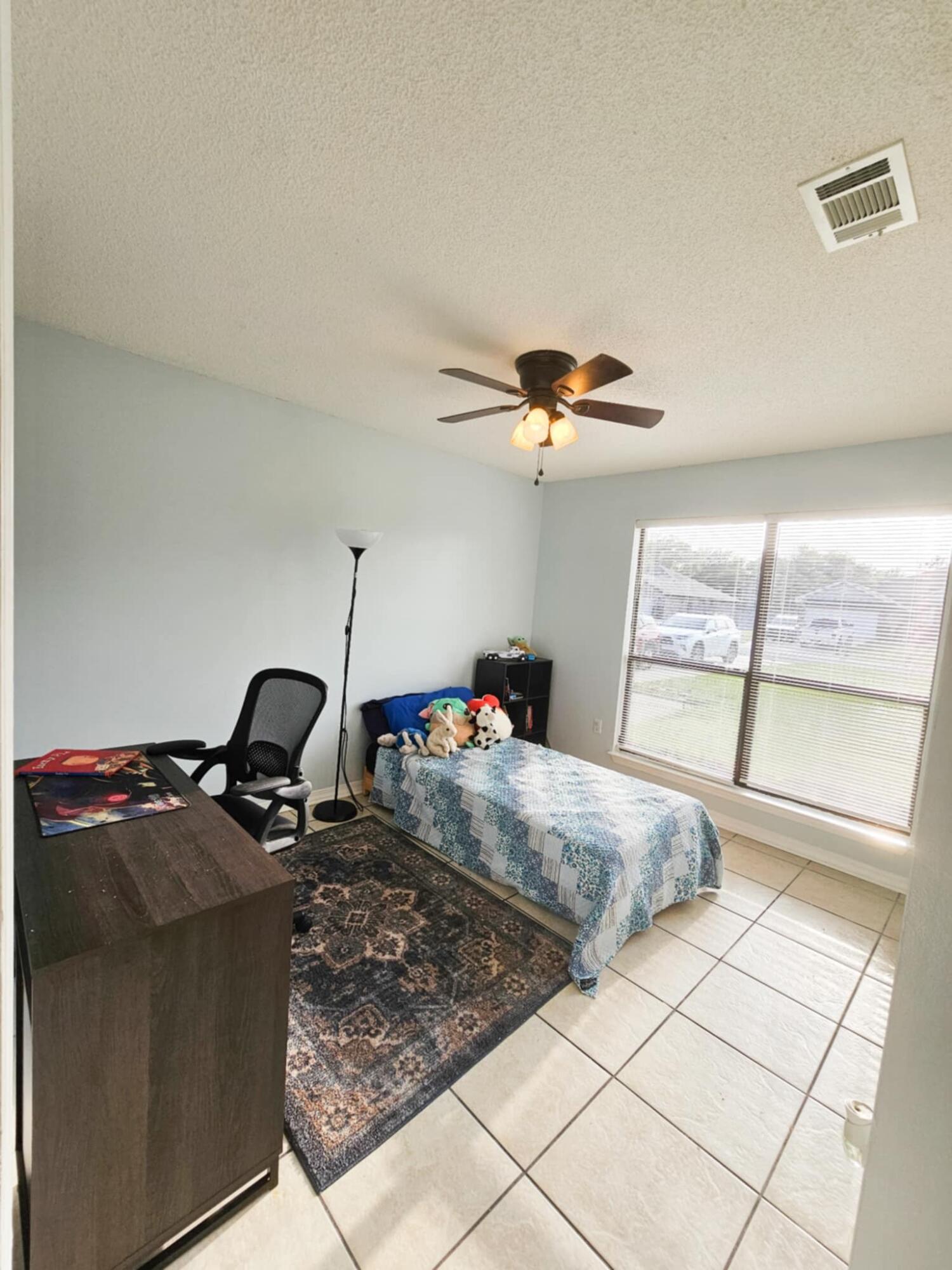 1920 Seahawk Lane Navarre, FL 32566 - Photo 17 of 30 a bed room with a bed