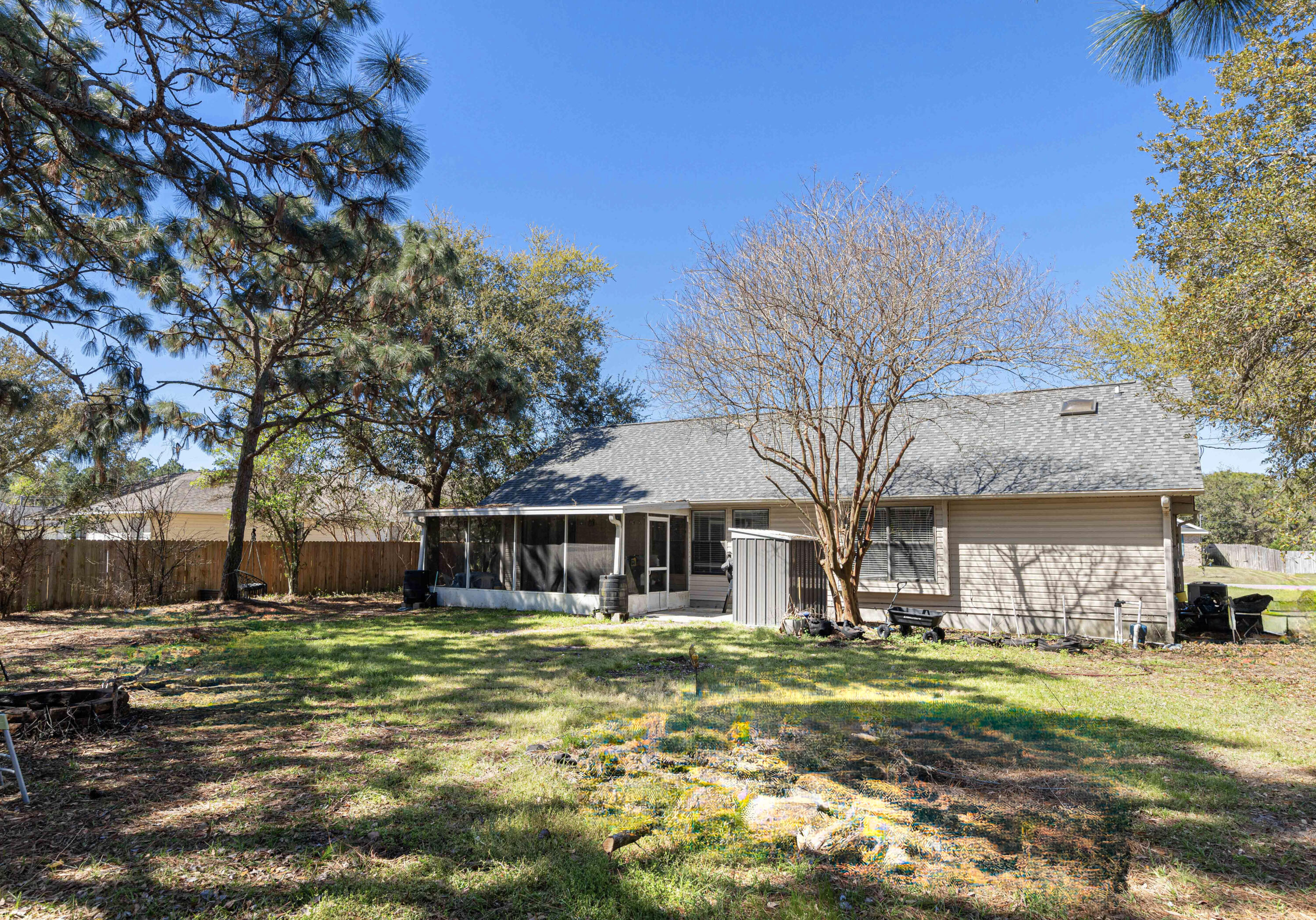 1920 Seahawk Lane Navarre, FL 32566 - Photo 30 of 30 a front view of a house with a garden