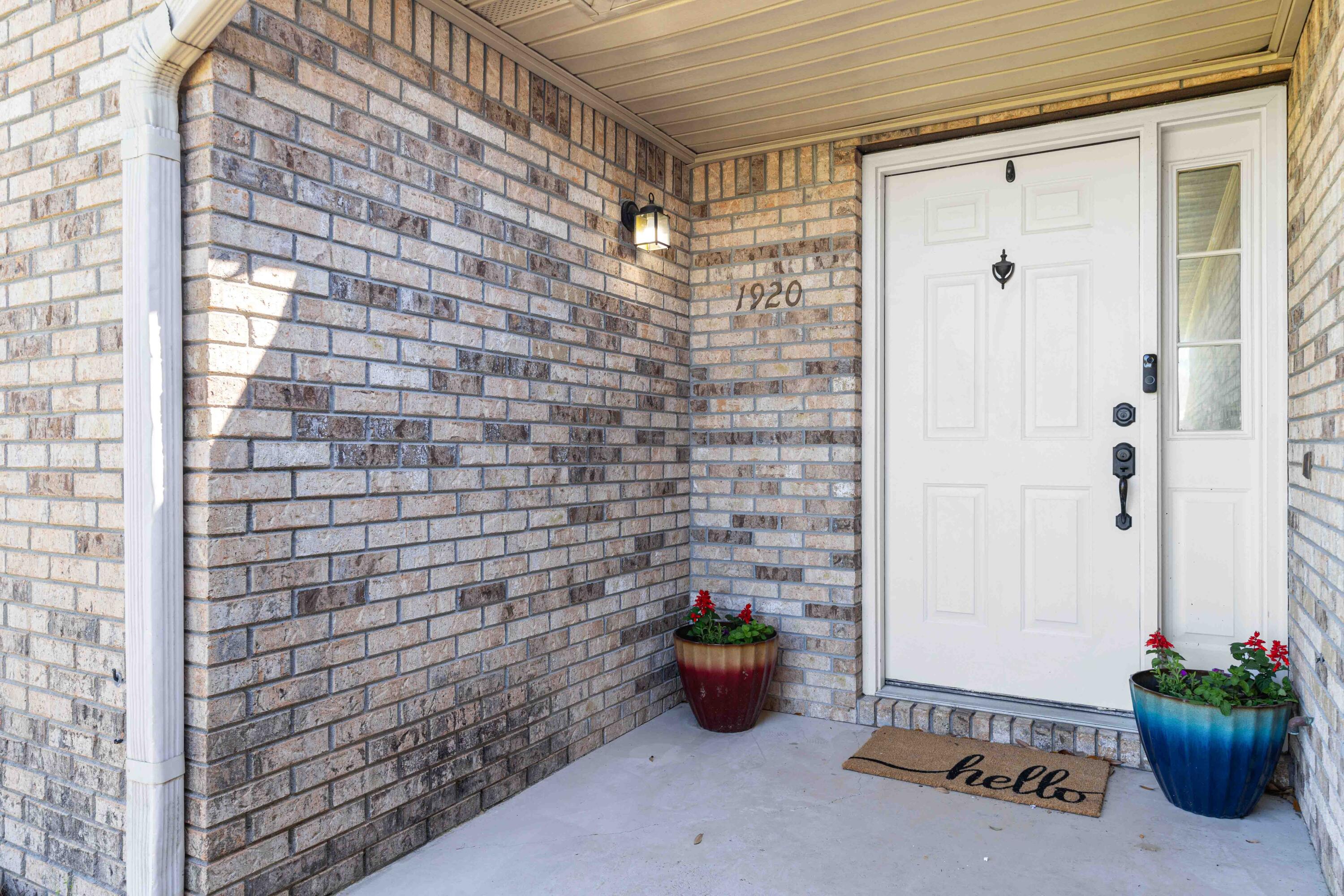 1920 Seahawk Lane Navarre, FL 32566 - Photo 3 of 30 a view of an outdoor space and porch