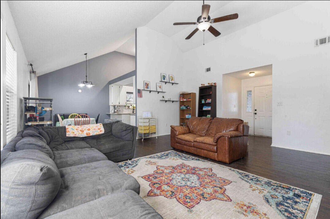 1920 Seahawk Lane Navarre, FL 32566 - Photo 9 of 30 a living room with furniture and a couch