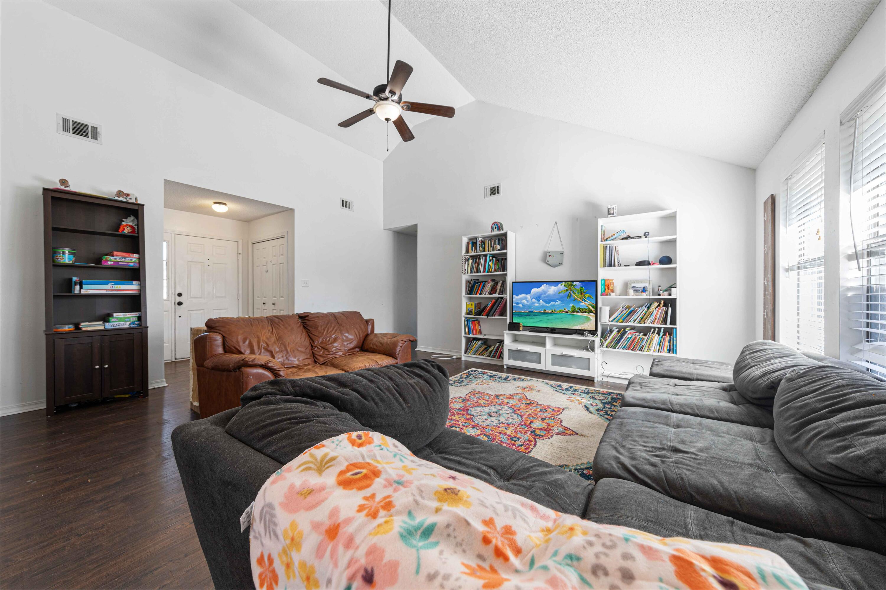1920 Seahawk Lane Navarre, FL 32566 - Photo 10 of 30 a living room with furniture and a flat screen tv